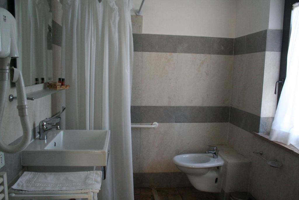 Vilka är de bästa hotellen i närheten av Cascate del Mulino? Saturnia Rum bild